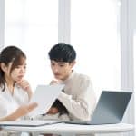 Asian family considering purchasing insurance