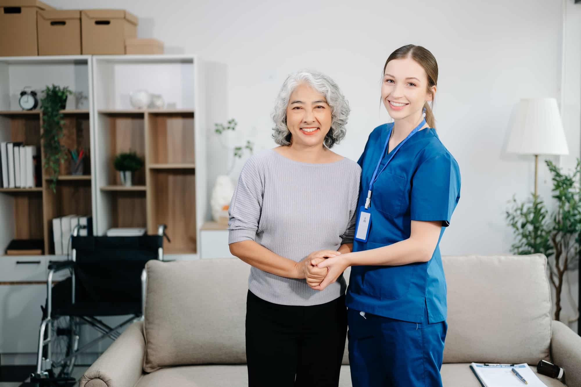 Doctors explain the use of medication to patients. Medical doctor holing senior patient's hands and